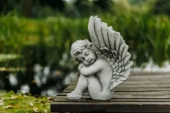 Gartendekoparadies Enfants & Anges-Ange assis avec des ailes