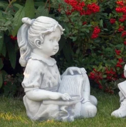 Gartendekoparadies Enfants & Anges-Fille avec livre préféré
