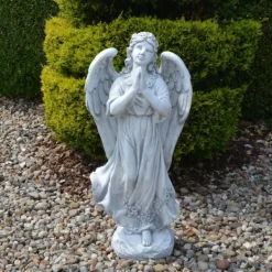 Gartendekoparadies Enfants & Anges-La figure d'ange se tient solidement sur une surface en pierre