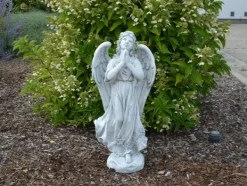 Gartendekoparadies Enfants & Anges-La figure d'ange se tient solidement sur une surface en pierre