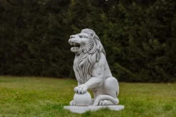 Gartendekoparadies Animaux-Statue de lion à gauche avec ballon