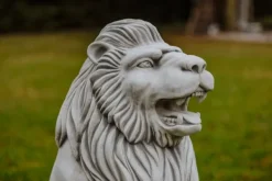 Gartendekoparadies Animaux-Statue de lion avec boule à droite
