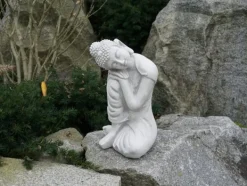 Gartendekoparadies Bouddhas-Statue d'un bouddha agenouillé