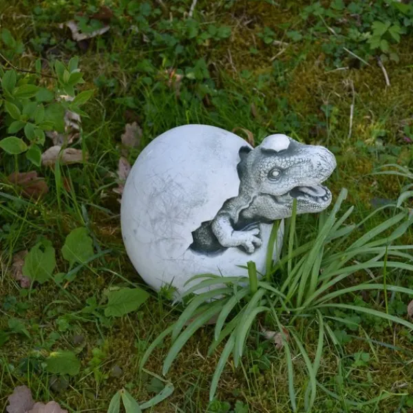 Gartendekoparadies Animaux-Un petit dinosaure sort de l'œuf